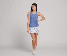 Load image into Gallery viewer, woman wearing printed tennis skirt and blue racerback tank
