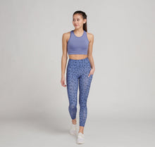 Load image into Gallery viewer, woman in blue cheetah leggings and crop top
